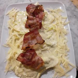 Ravioli crema di porri e pancetta